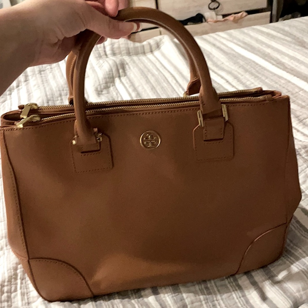 Brown Tory Burch handbag.